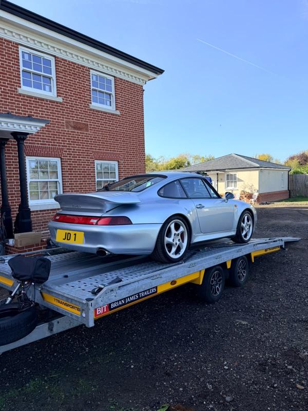 Porsche 911 (993) strapped down on the trailer