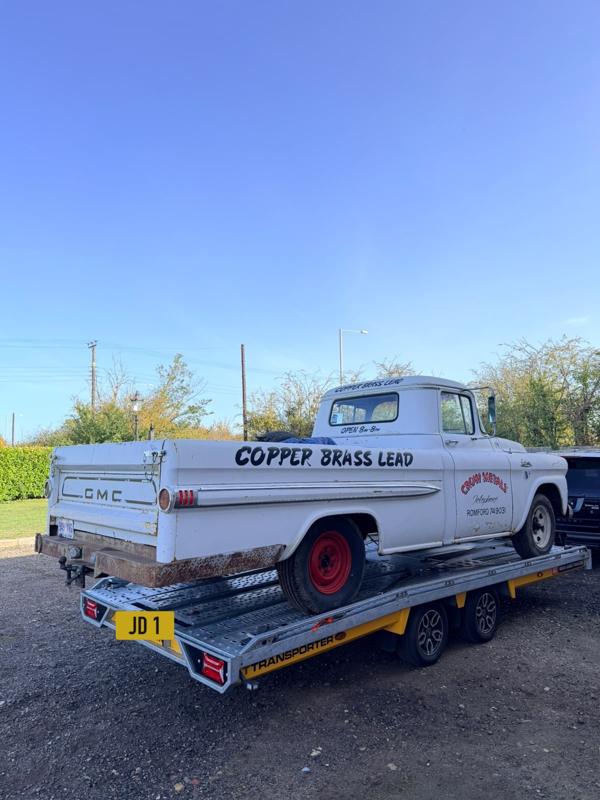 Classic GMC pickup on the trailer, rear view