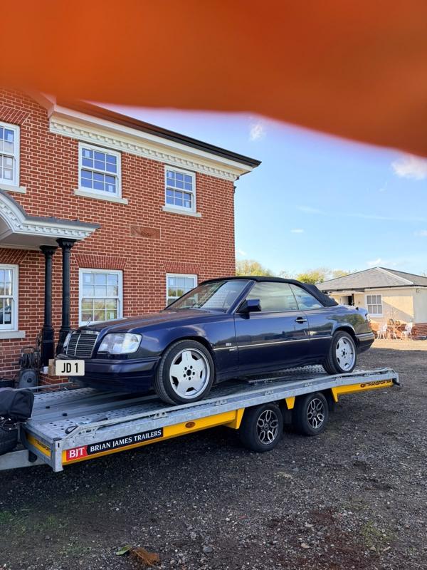 Mercedes E-Class cabriolet on the trailer