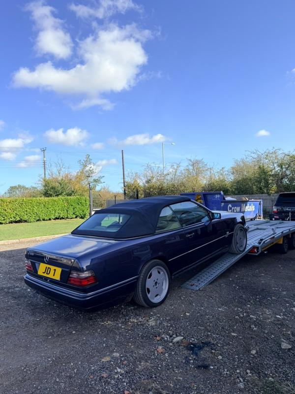 Mercedes E-Class cabriolet being loaded