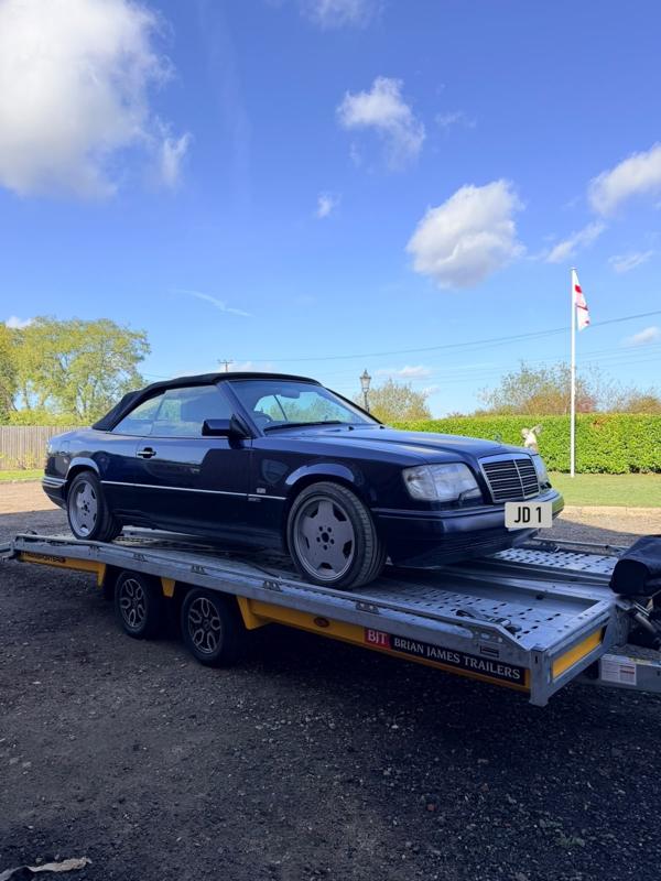 Mercedes E-Class cabriolet on the trailer
