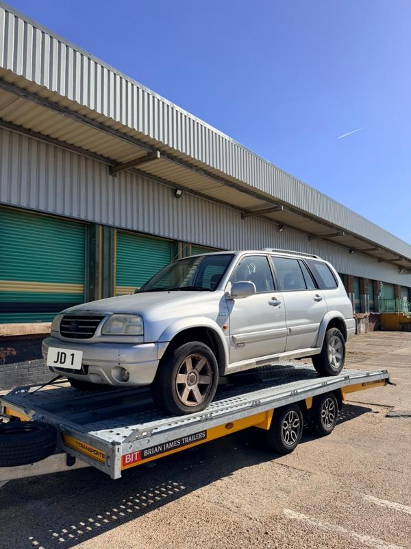 Suzuki Grand Vitara on the trailer