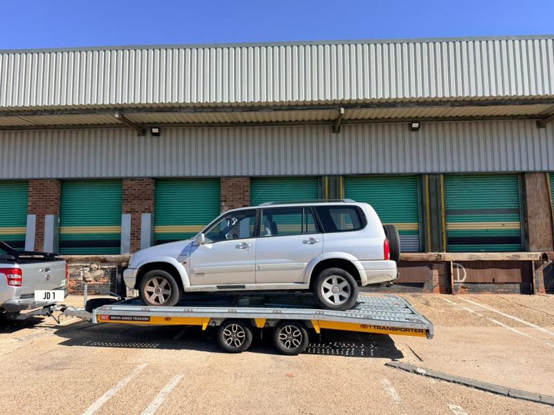 Suzuki Grand Vitara on the trailer