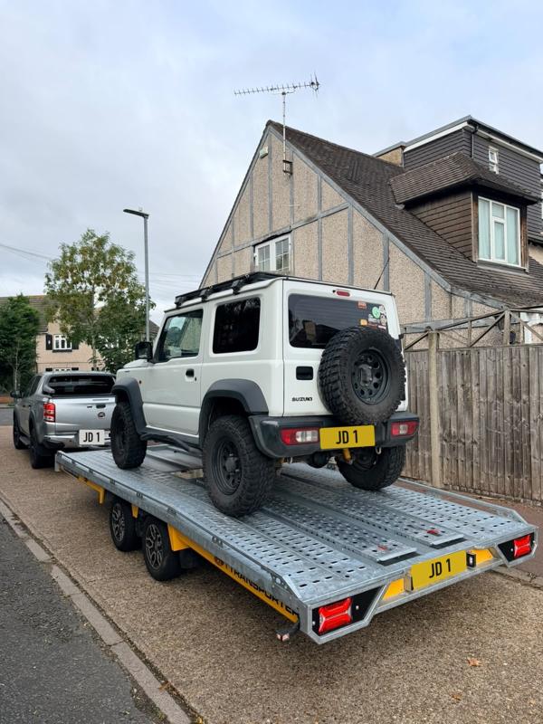 Suzuki Jimny on the trailer, rear view