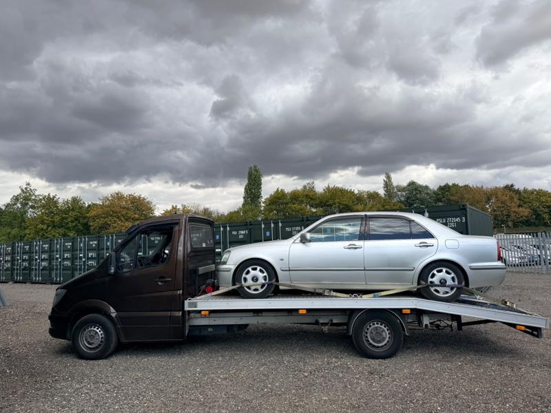 Silver saloon recovered on the truck