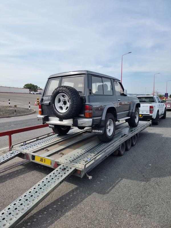 Nissan Safari 4x4 on the trailer at the port