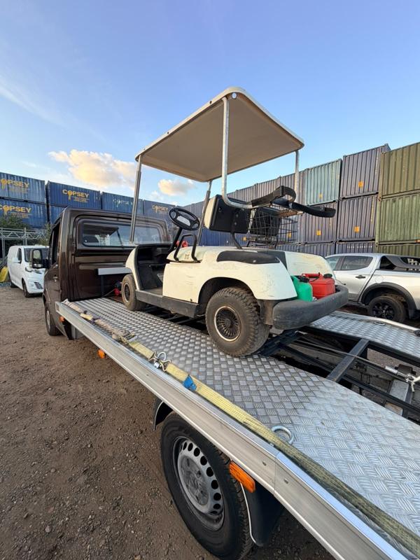 Golf buggy on the recovery truck
